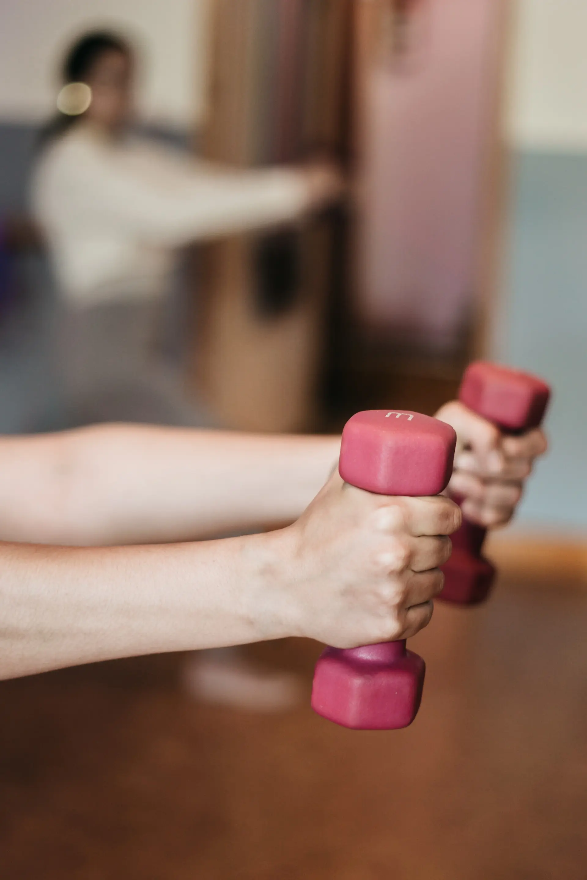 Woman exercising on mat